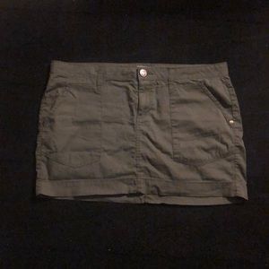 Dark green mini skirt